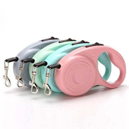 Automatic retractable dog leash in pastel colors with nylon rope and polished plastic handle for small and medium dogs